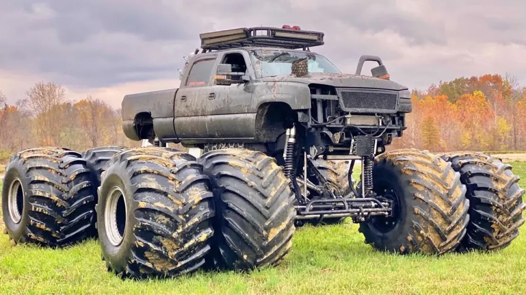 Monster Max 2 driving outdoors with giant tires and twin-diesel setup.