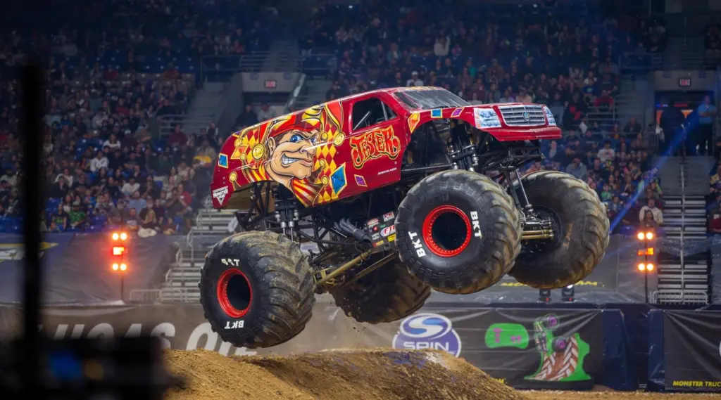 Jester monster truck racing near track boundary during Philadelphia event.